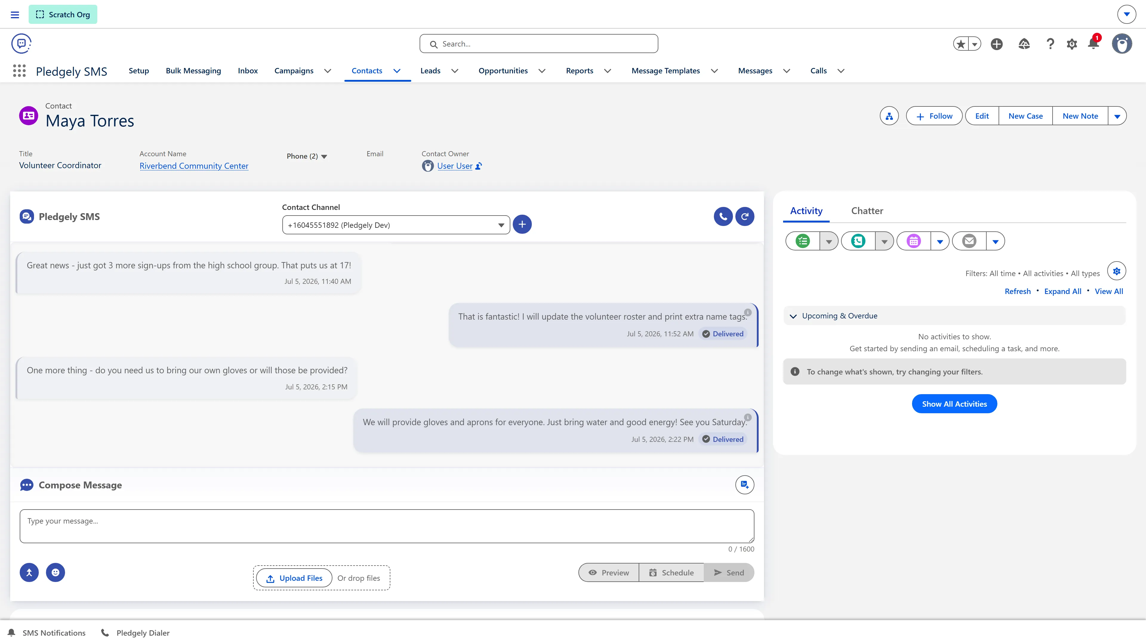 A threaded SMS conversation on a contact record, with templates and scheduling in the composer