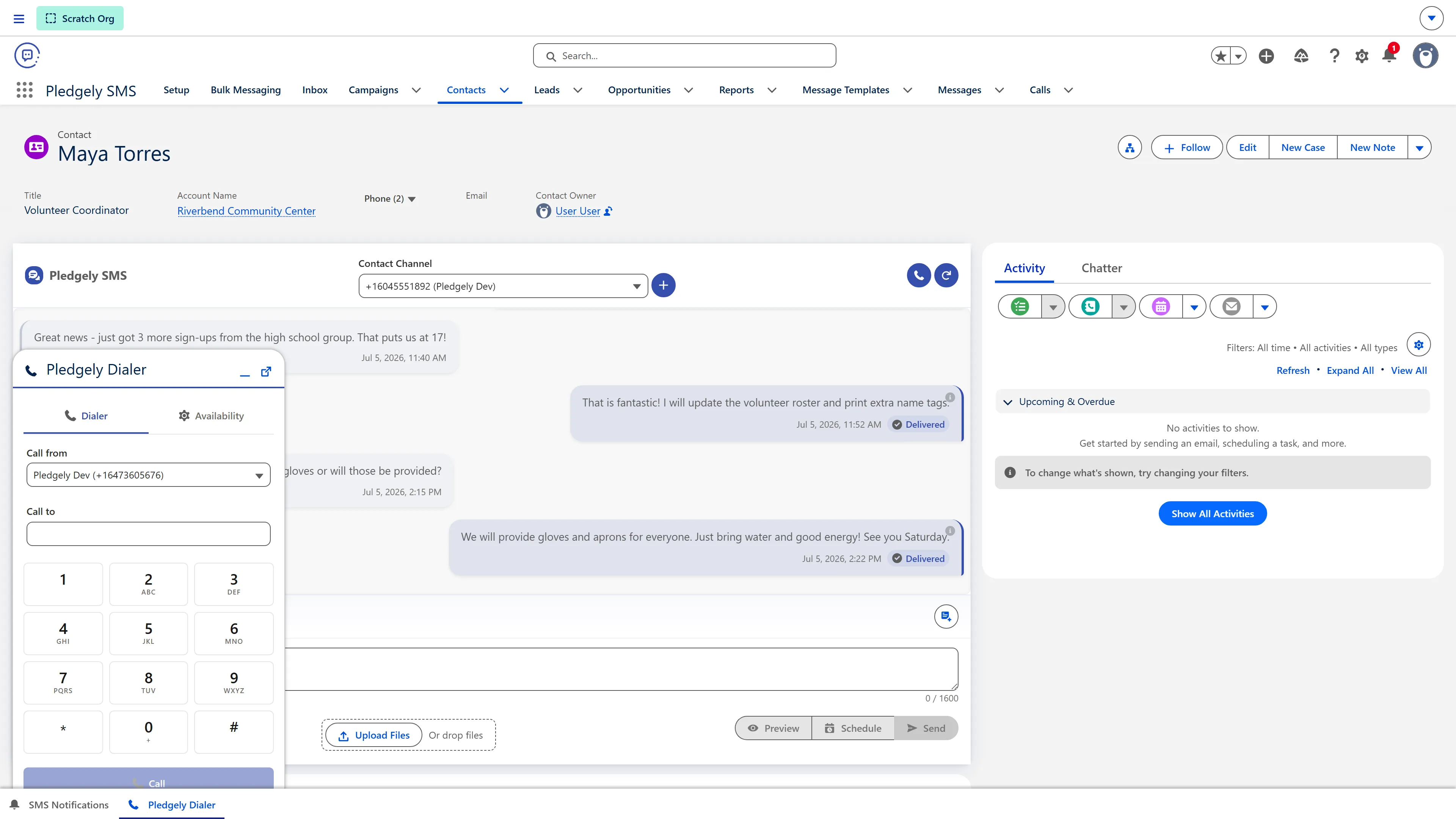 The Pledgely SMS utility-bar dialer handling a call inside Salesforce, with the linked record open